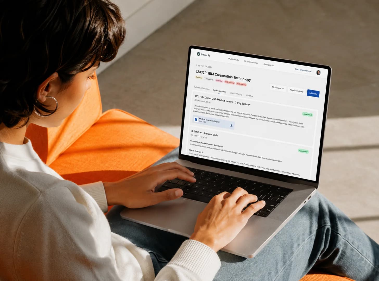 Swiss Re governance platform on a laptop